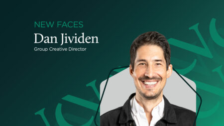 Headshot of Dan Jividen, Senior Group Creative Director on a dark green background